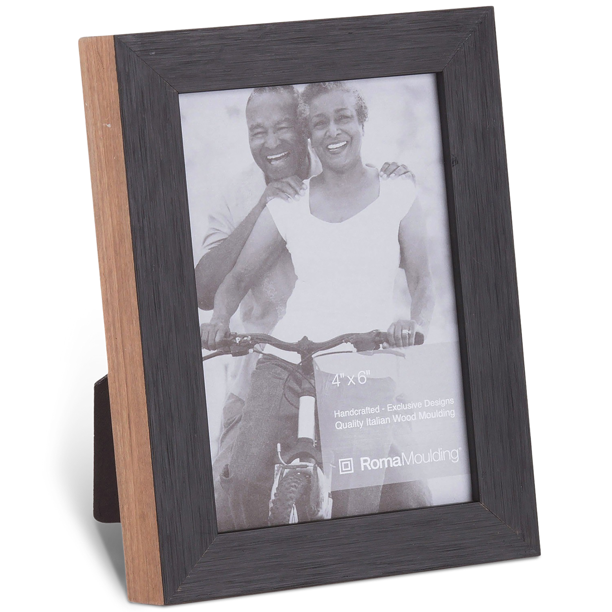 A wooden photo frame with a dark border displays a smiling couple riding a bicycle together. The photo is black and white, conveying joy and togetherness.