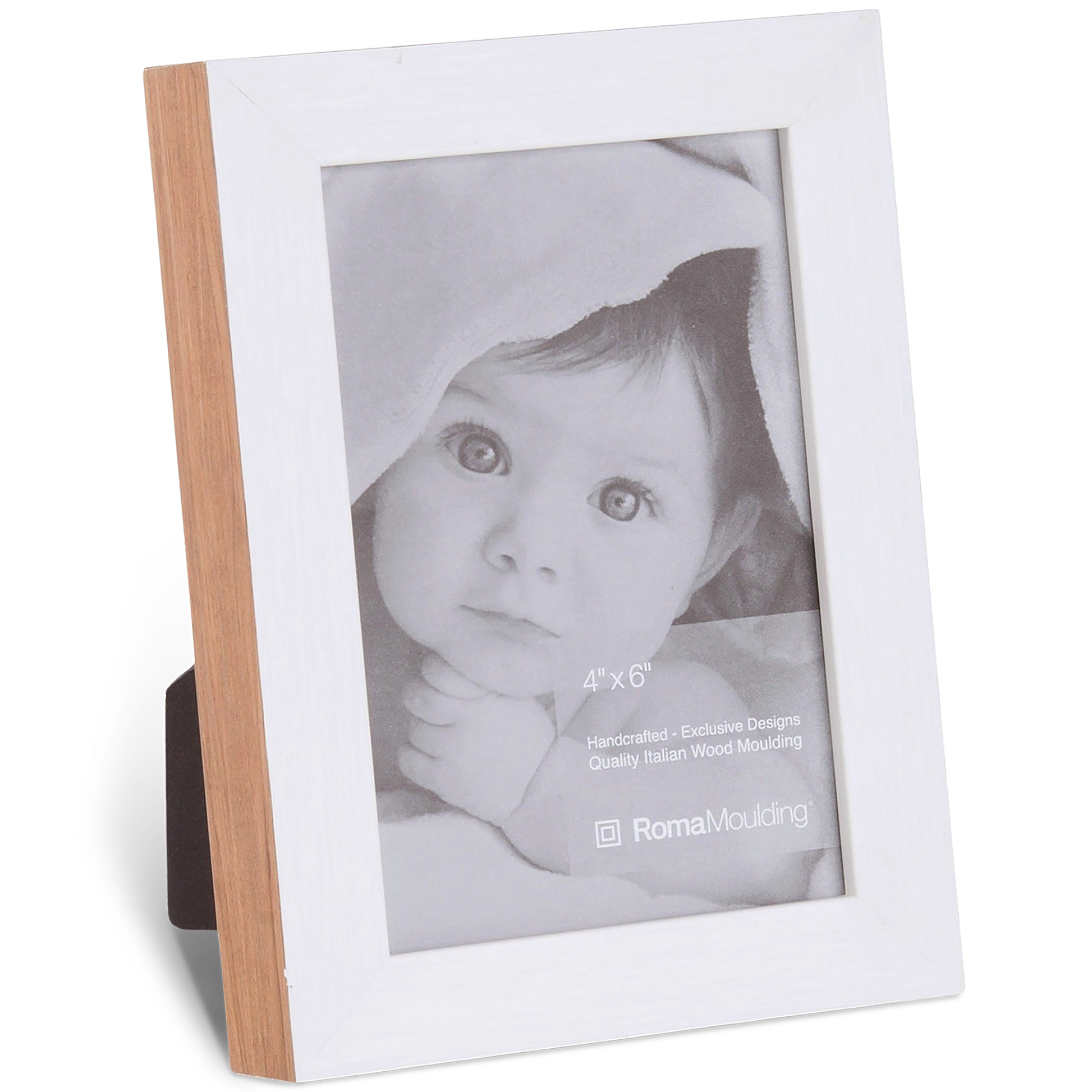 Framed photo of a baby wrapped in a soft blanket, gazing upward. The frame is wood with a white border, displaying a gentle and serene expression.