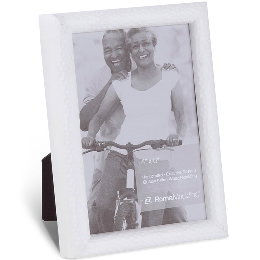 Silver photo frame with a textured edge, holding a black and white image of a smiling couple on a bicycle. The label reads "4x6 handcrafted."