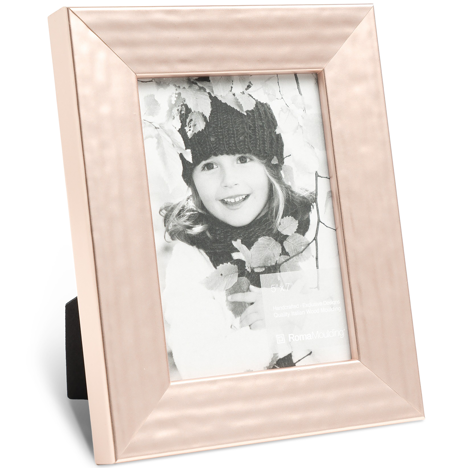 Framed black and white photo of a smiling child in a knit hat, surrounded by fall leaves. The rose gold frame adds warmth and elegance.
