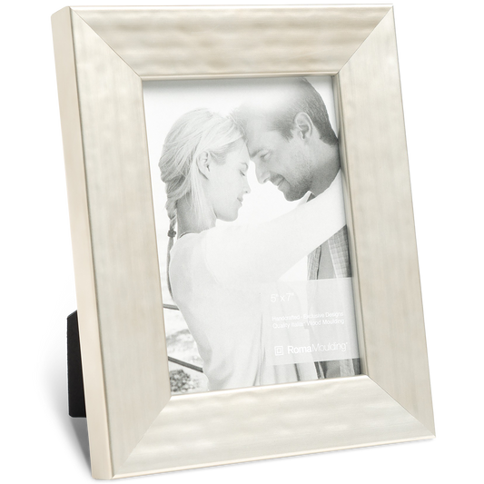 Silver photo frame with a black-and-white picture of a couple embracing, conveying warmth and affection. Frame is angled, showcasing its elegant design.