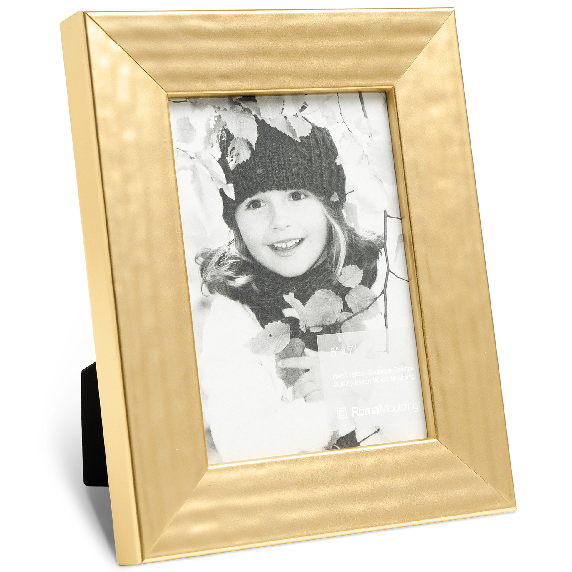 A gold, textured picture frame displaying a black-and-white photo of a smiling child in a knit hat surrounded by leaves, conveying warmth and joy.