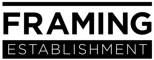 A logo for Framing Establishment. It features the word "FRAMING" in a large, bold font above the smaller word "ESTABLISHMENT," all contained within a rectangular border.