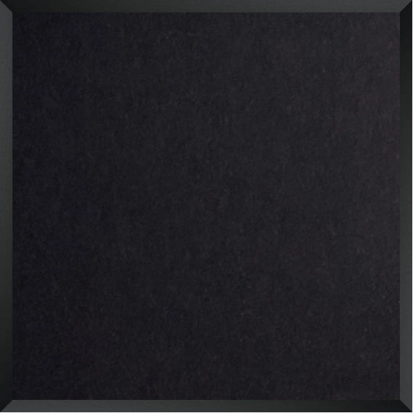 Solid black square with a textured surface