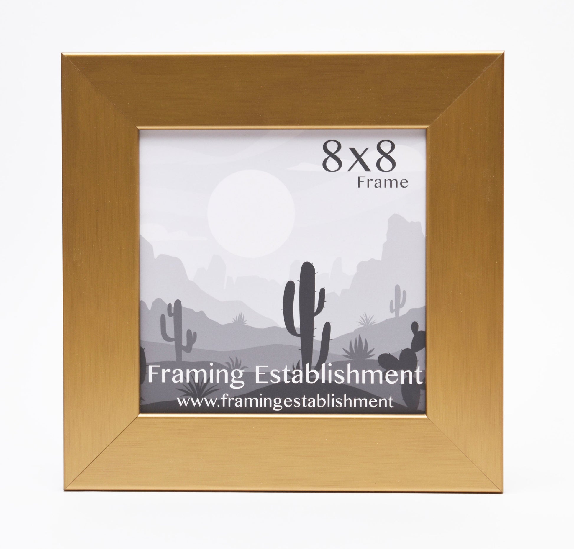 A square, gold picture frame with a placeholder image of a desert landscape featuring cacti and mountains. Text reads "8x8 Frame, Framing Establishment."