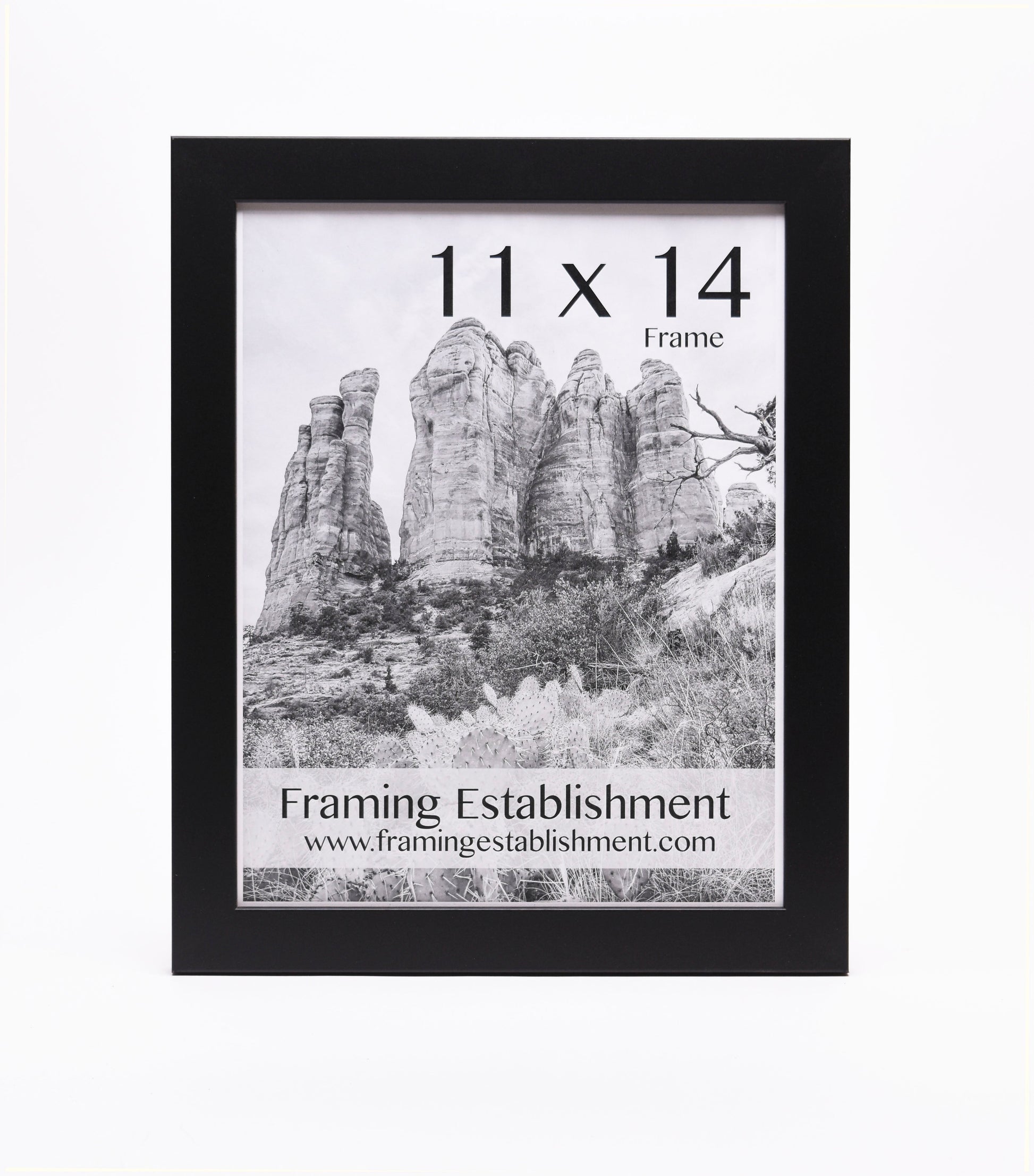 Black frame displaying a black-and-white photo of towering rock formations, labeled "11 x 14 Frame" with "Framing Establishment" and website below.
