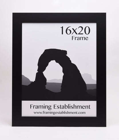 Black frame displaying a simple black and white illustration of a rock arch. Text reads "16x20 Frame, Framing Establishment," with the website URL below.