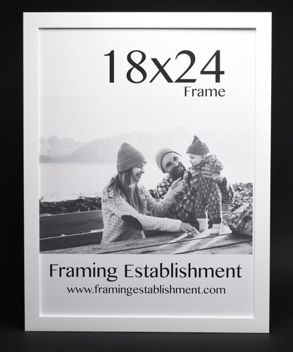A white satin wall frame with a glass front, labeled '8x10 FRAME' and a picture of a dog inside. The frame has a white backing and a sawtooth hanger.