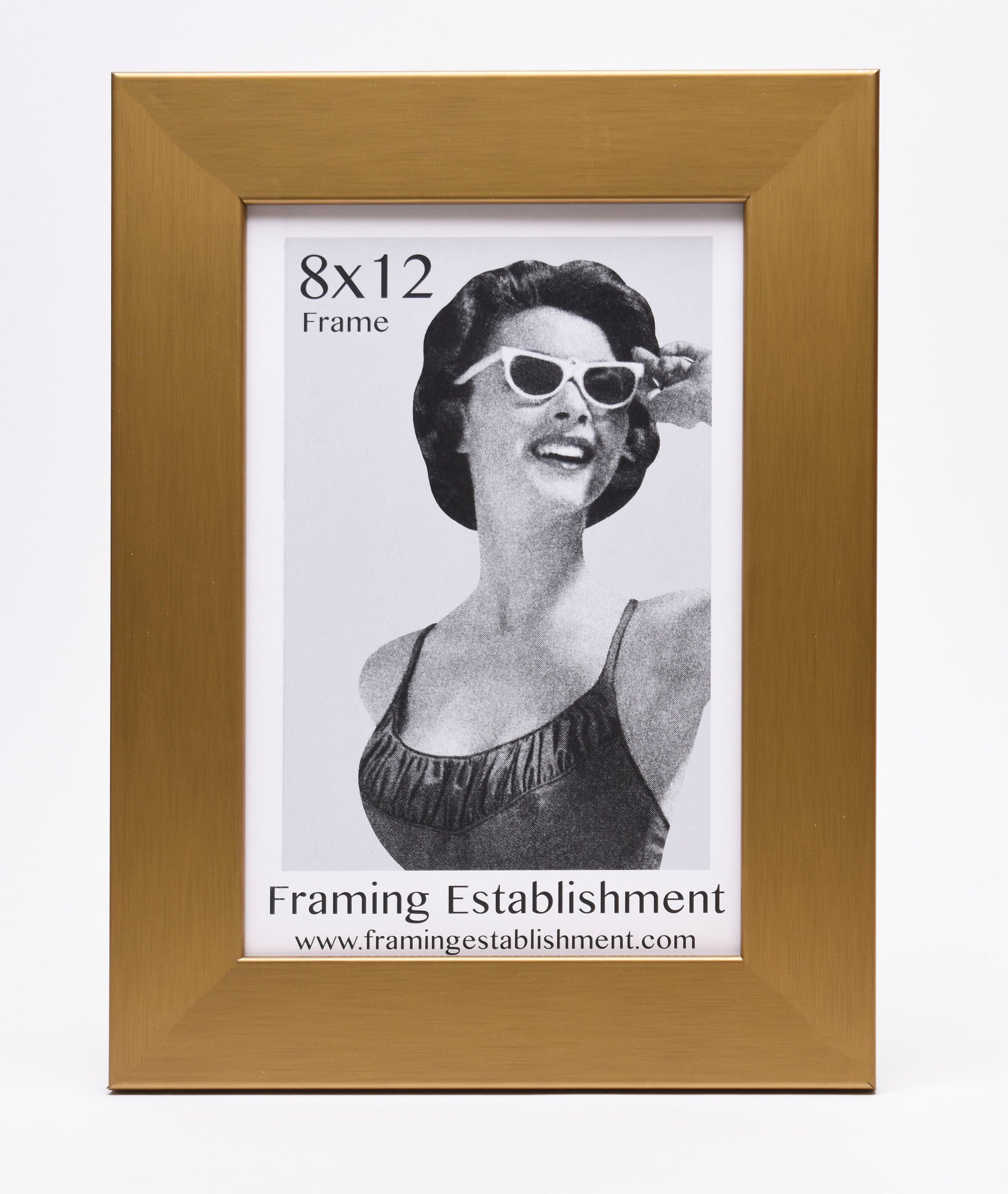 Brown-framed 8x12 photo featuring a woman in retro sunglasses and a swimsuit, exuding a joyful 1950s vibe. Text at bottom reads "Framing Establishment."