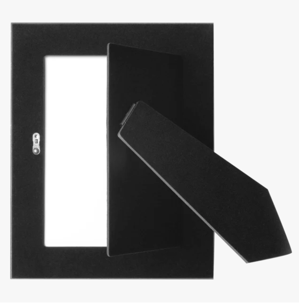 Black rectangular photo frame with a wide border and an open back support, designed for standing display. A small metal hook is visible on the left.