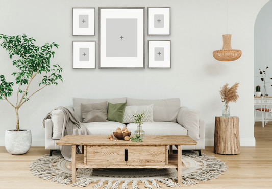 Modern living room with a gray sofa, wooden coffee table, and decorative elements.