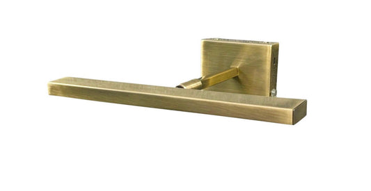 Brass door handle on a white background