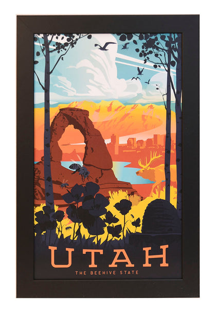 Framed poster of Utah featuring vibrant colors, showing Delicate Arch, wildlife, and a city skyline under a dramatic sky. Text reads "Utah the Beehive State."